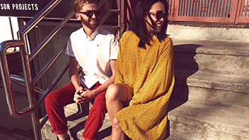 Couple sitting on outside stairs